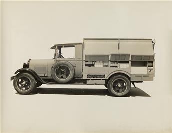 (TRUCKING & TRANSPORTORTATION) Album with 55 photographs associated with the C&P Telephone Company in Washington, D.C., showing a diver